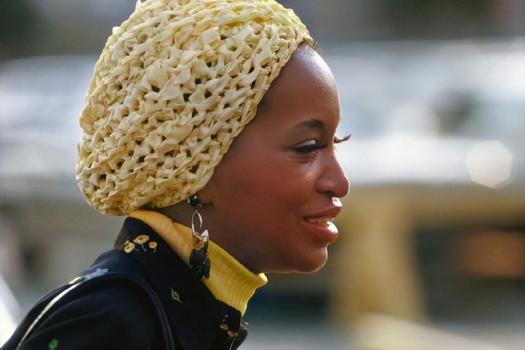 a close up of a person wearing a hat