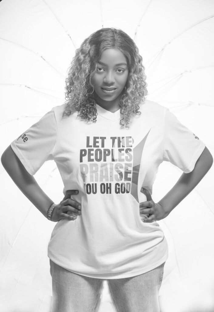 Stylish woman in T-shirt with inspirational message in monochrome.